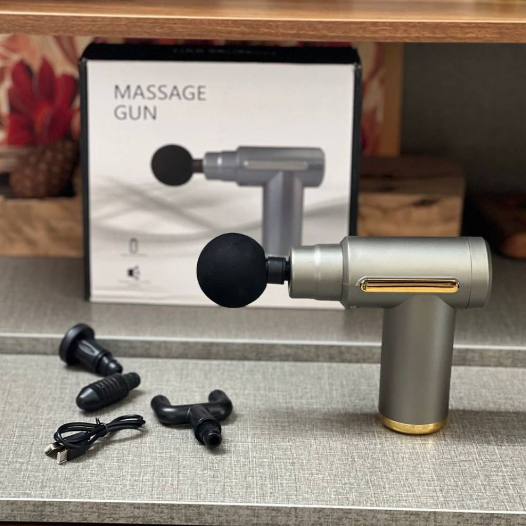91dc8012a8875e642829bf4a7523c87d ماساژور چکشي تفنگي z26 MASSAGE GUN - Image 1